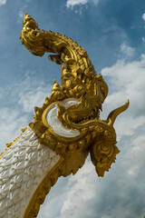 Fototapeta na wymiar golden great Naga statue in thailand