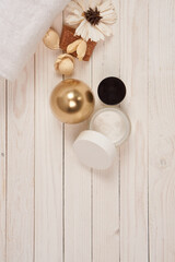 White towel cosmetics bathroom accessories wooden background scenery