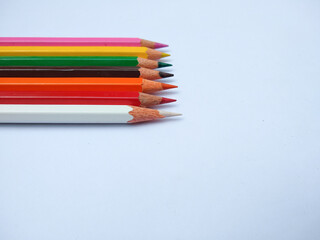 Colour pencils on white background