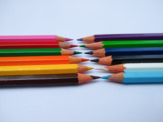 Colour pencils on white background