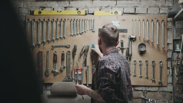 Atmospheric workshop: panel with tools, screwdrivers, wrenches.