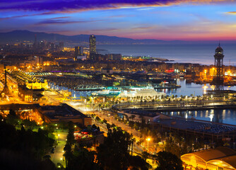 Fototapeta na wymiar Port Vell at Barcelona in dawn. Catalonia, Spain
