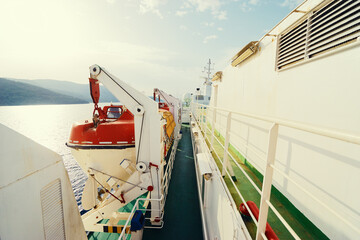 Transportation and safety. Lifeboat on ferry deck.