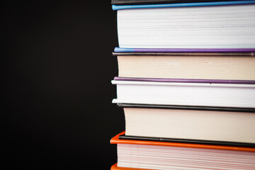 Collection books on black background.