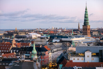 Copenhagen skyline in evening light. Copenhagen old town and copper spiel