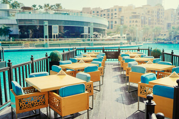 Fototapeta na wymiar Cafe terrace with city view.