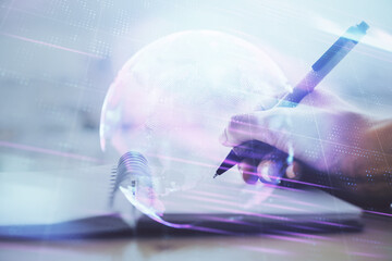 Tech theme hologram over woman's hands taking notes background. Concept of hightech. Double exposure