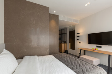 Interior of a luxury master bed hotel bedroom