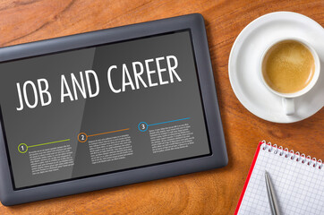 Tablet on a wooden desk - Job and Career