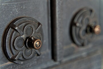 Detail from cast iron fireplace, Iron handle.