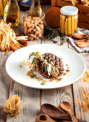Gourmet grilled cutlet with mushroom sauce