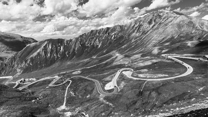 Mountain asphalt road serpentine. Winding Grossglockner High Alpine Road with Edelweissspitze on background, Austria