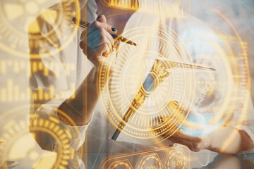 Tech theme hologram over woman's hands taking notes background. Concept of hightech. Double exposure