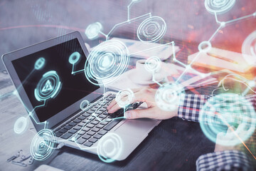 Social network theme hologram with businessman working on computer on background. Concept of world...