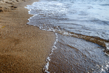 The bubble wave on the sand.