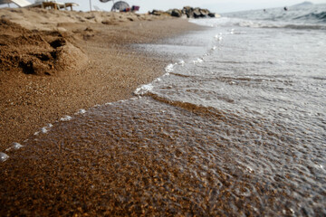 The bubble wave on the sand.