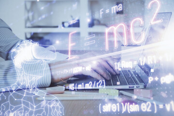 Science formula hologram with man working on computer on background. Education concept. Double...