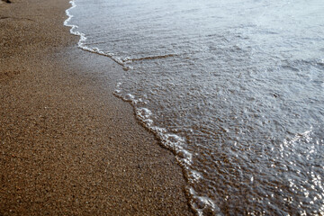 The bubble wave on the sand.