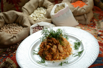 traditional turkish ottoman food in front of legume family sacks