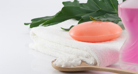 A bar of soap and a clean white towel