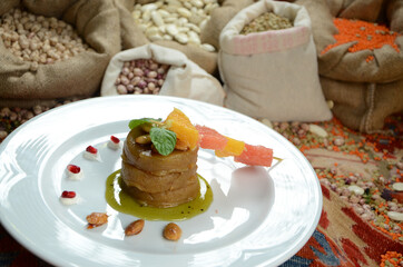 turkish traditional dessert in front of legume family sacks