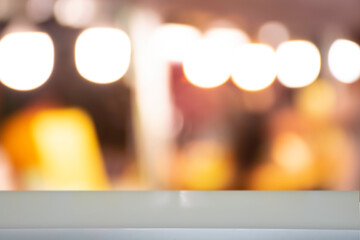 Product display on brown wooden table Bokeh background from the bulb shop