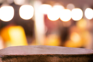 Product display on brown wooden table Bokeh background from the bulb shop