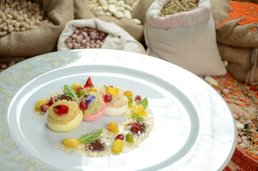 turkish traditional dessert in front of legume family sacks