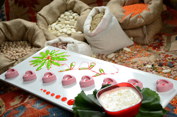 turkish traditional dessert in front of legume family sacks