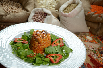 traditional turkish ottoman food in front of legume family sacks