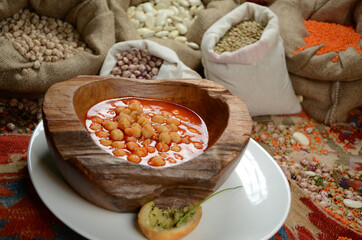 traditional turkish ottoman food in front of legume family sacks