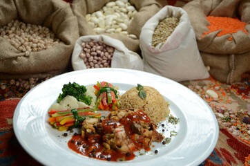 traditional turkish ottoman food in front of legume family sacks
