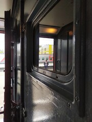 View of the platform from the passenger train vestibule