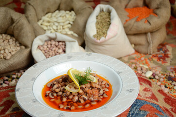 traditional turkish ottoman food in front of legume family sacks