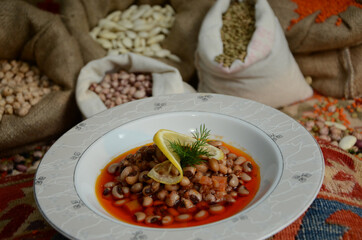traditional turkish ottoman food in front of legume family sacks