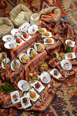 traditional turkish ottoman food in front of legume family sacks