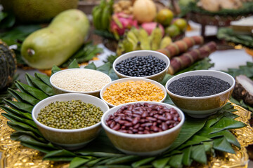 Whole grain, nut, bean, rice seed and other food in bowl for sacrificial offering in Thai traditional celebration worship.