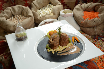 traditional turkish ottoman food in front of legume family sacks