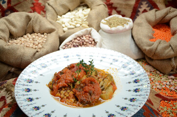 traditional turkish ottoman food in front of legume family sacks