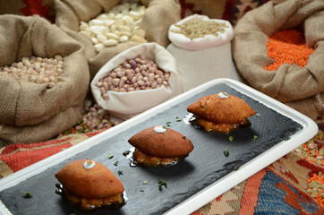 traditional turkish ottoman food in front of legume family sacks
