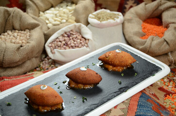 traditional turkish ottoman food in front of legume family sacks