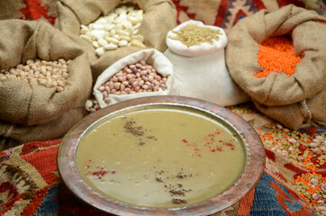 traditional turkish cuisine soup in front of legume family sacks