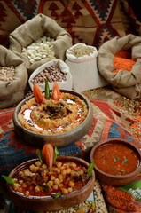 traditional turkish ottoman food in front of legume family sacks
