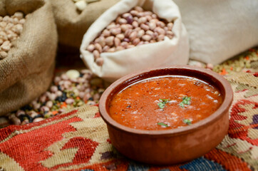 traditional turkish cuisine soup in front of legume family sacks