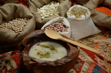 traditional turkish cuisine soup in front of legume family sacks