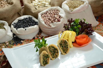 traditional turkish ottoman food in front of legume family sacks