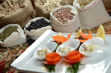 traditional turkish ottoman food in front of legume family sacks