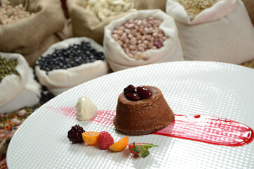 traditional dessert in front of legume family sacks