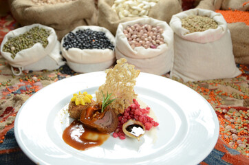 traditional dessert in front of legume family sacks