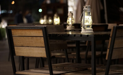 Light of the lamp on the wooden table